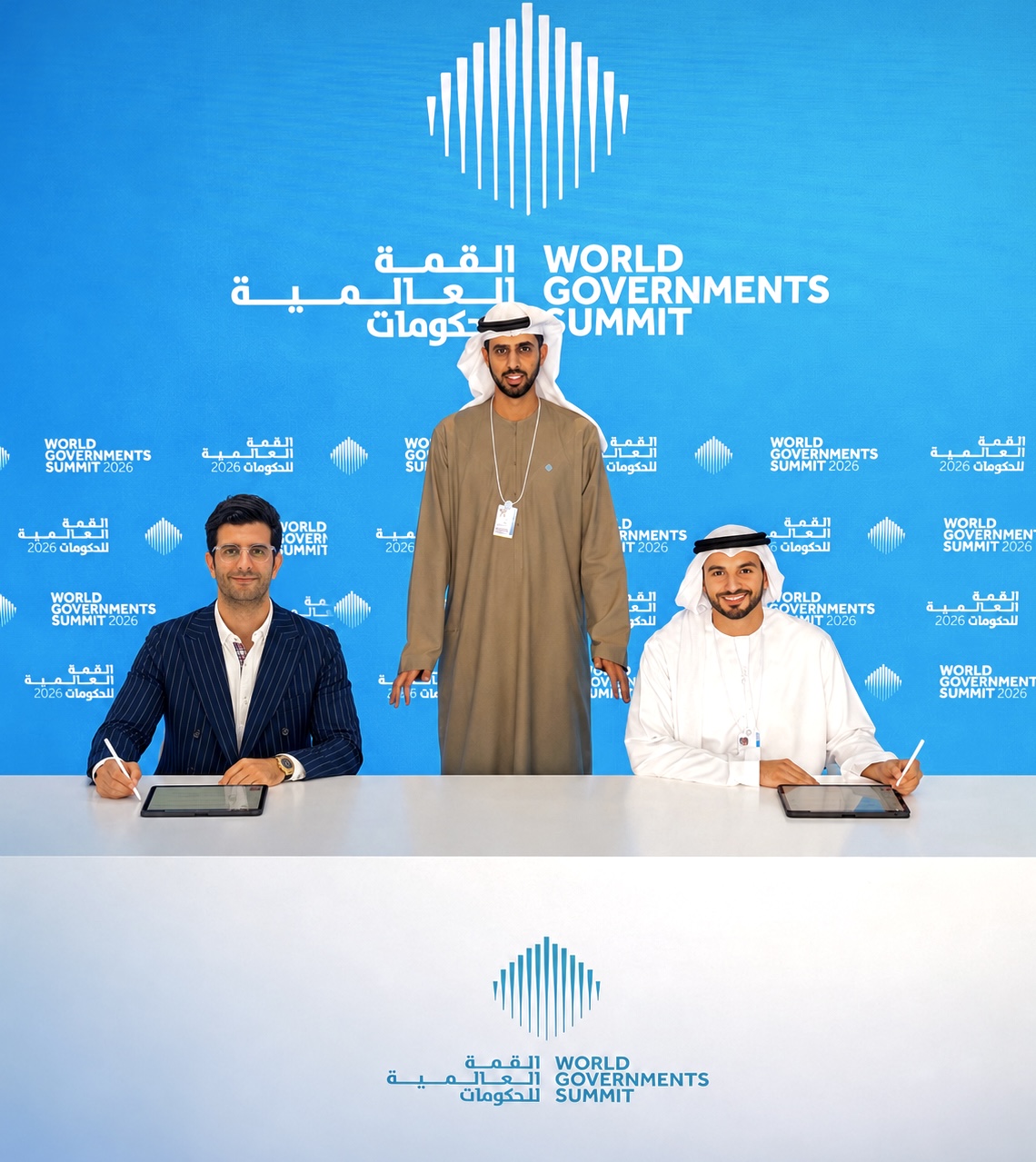 Saeed Al Hasan signing partnership agreement with World Governments Summit and UAE government on AI-powered digital maturity and digital footprint assessment